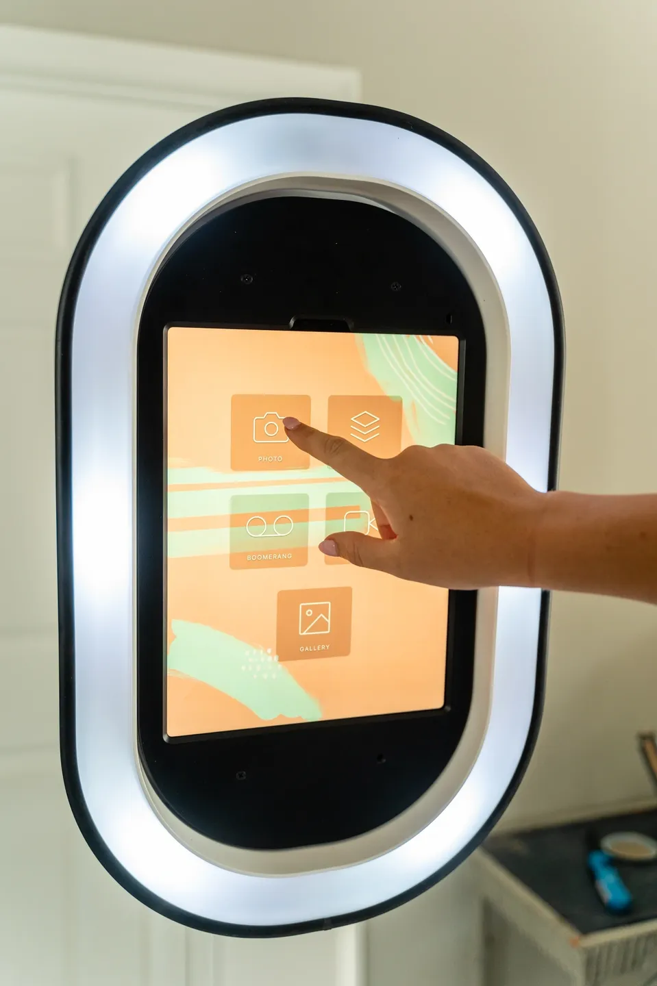 A person touching an interactive touch screen